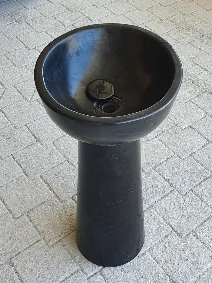 Toros black marble pedestal sink with oval basin on a tall stand; bathroom stone sink