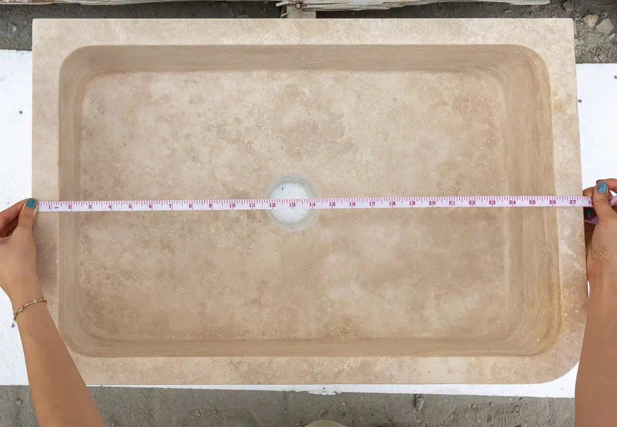 Troia Light Travertine rectangular farmhouse kitchen sink in beige stone.