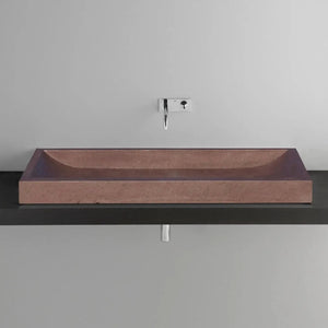 Noce Travertine rectangular above-vanity bathroom sink honed on black countertop.