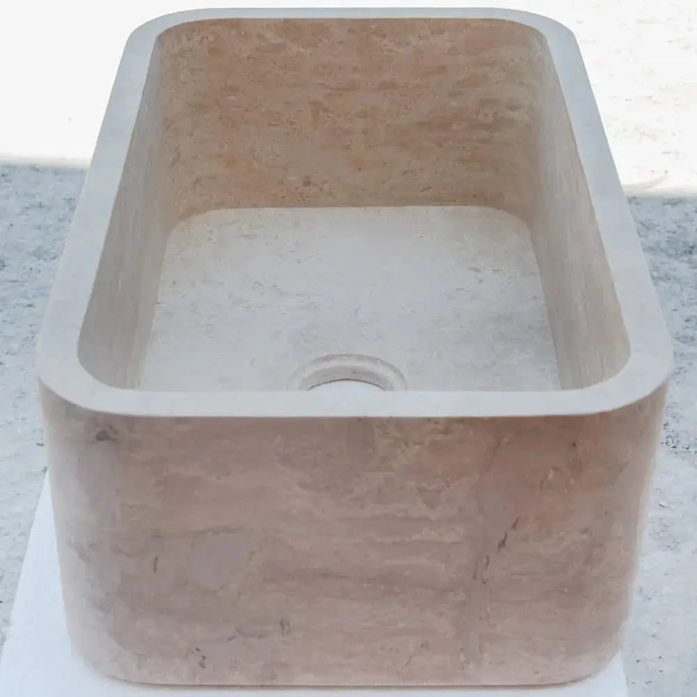Troia Light Travertine rectangular farmhouse kitchen sink with honed finish in light beige stone