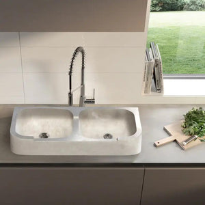 Troia Light Travertine 2-bowl curved farmhouse kitchen sink by Villohome with high-arc pull-down faucet.