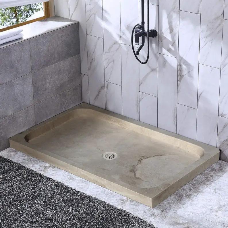Troia Light Travertine rectangular shower base, hand-carved from solid block, beige with subtle veining