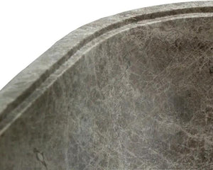 Villohome Tundra Gray Marble Bathtub, hand-carved solid marble with gray veining, edge close-up.