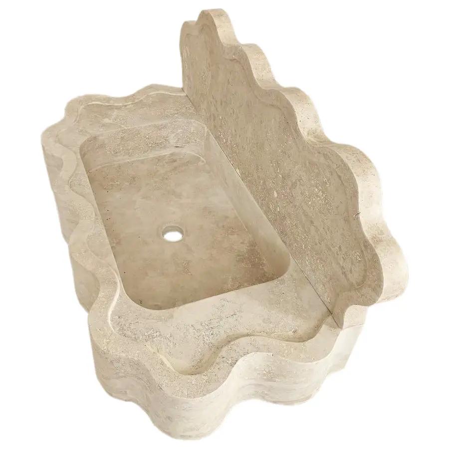 Tuscany Beige Travertine wall-mount bathroom sink with wavy edges by Villohome
