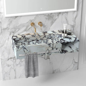 Calacatta Viola marble wall-mount bathroom sink with gold faucet and towel shelf