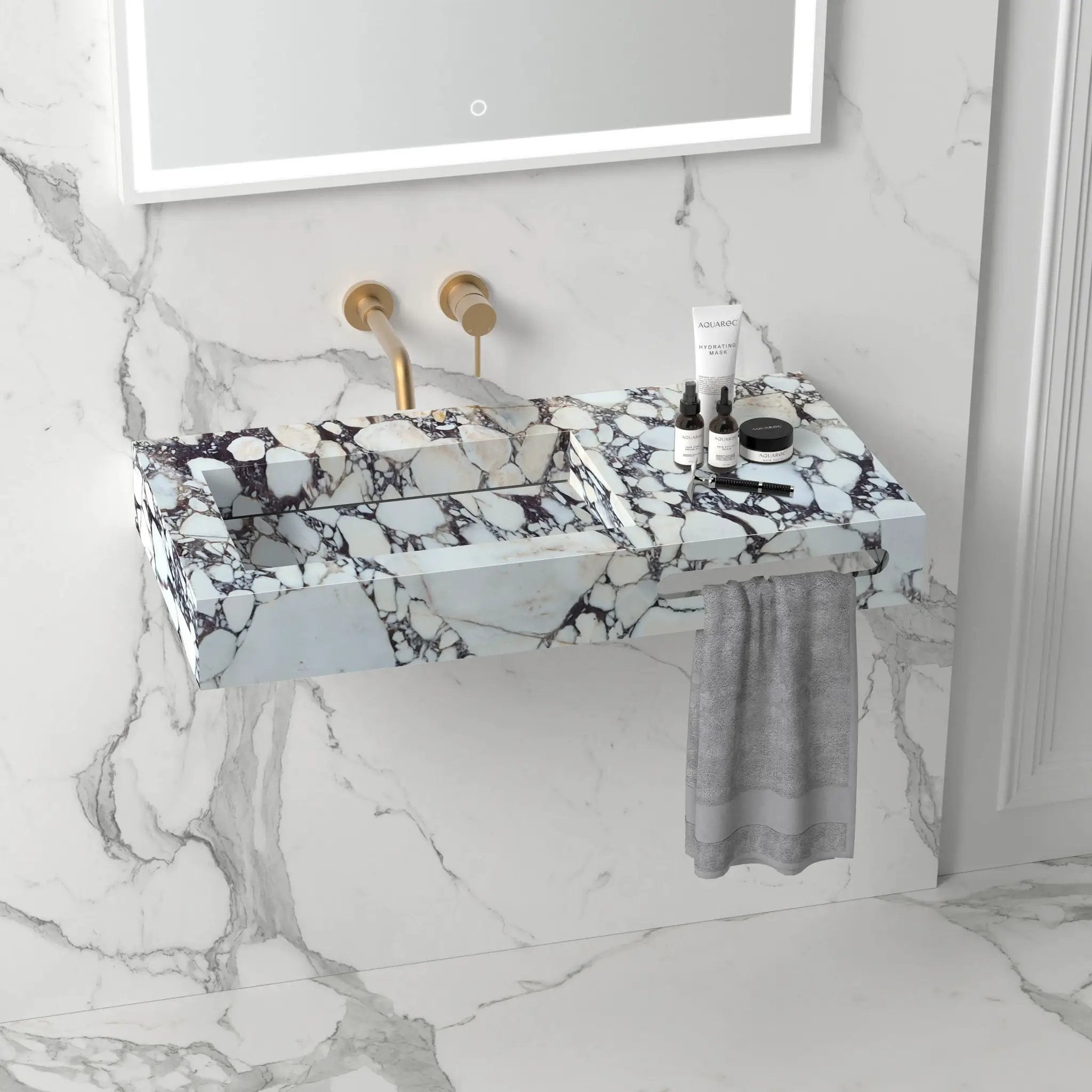 Calacatta Viola marble wall-mount bathroom sink with hidden drain and towel holder; gold fixtures