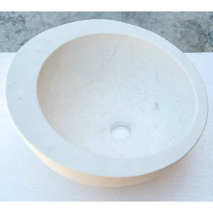 White limestone vanity sink by Villohome with a sloped rim and round bowl