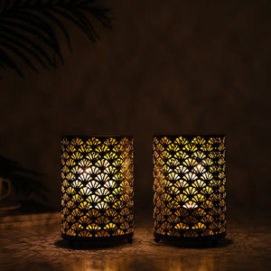 6.5-inch tall metal table lamp battery lanterns, set of 2, by JHY DESIGN, with intricate perforated pattern and warm LED glow.