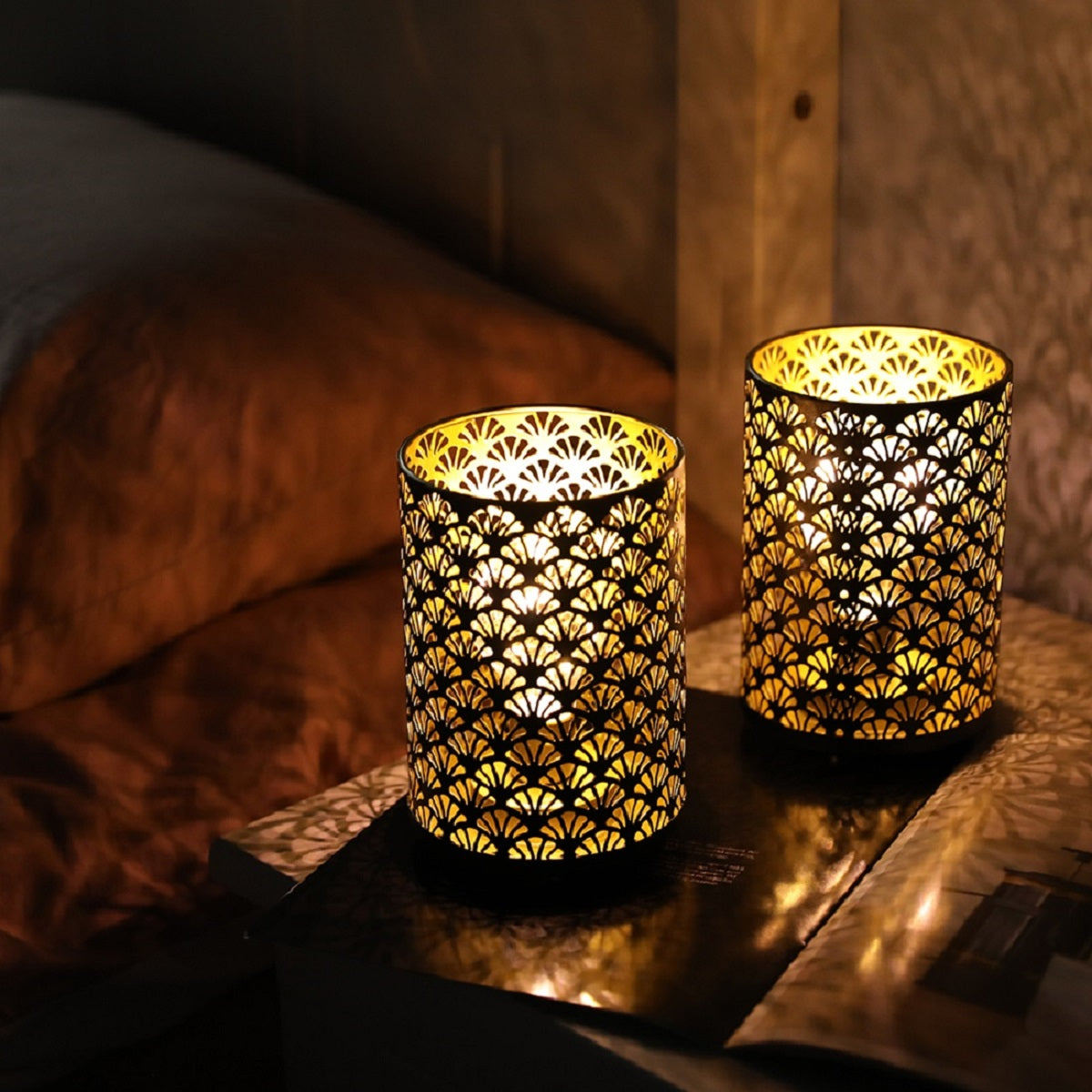 6.5-inch tall metal table lamp lanterns, set of 2, battery-operated with warm glow through a perforated floral pattern.