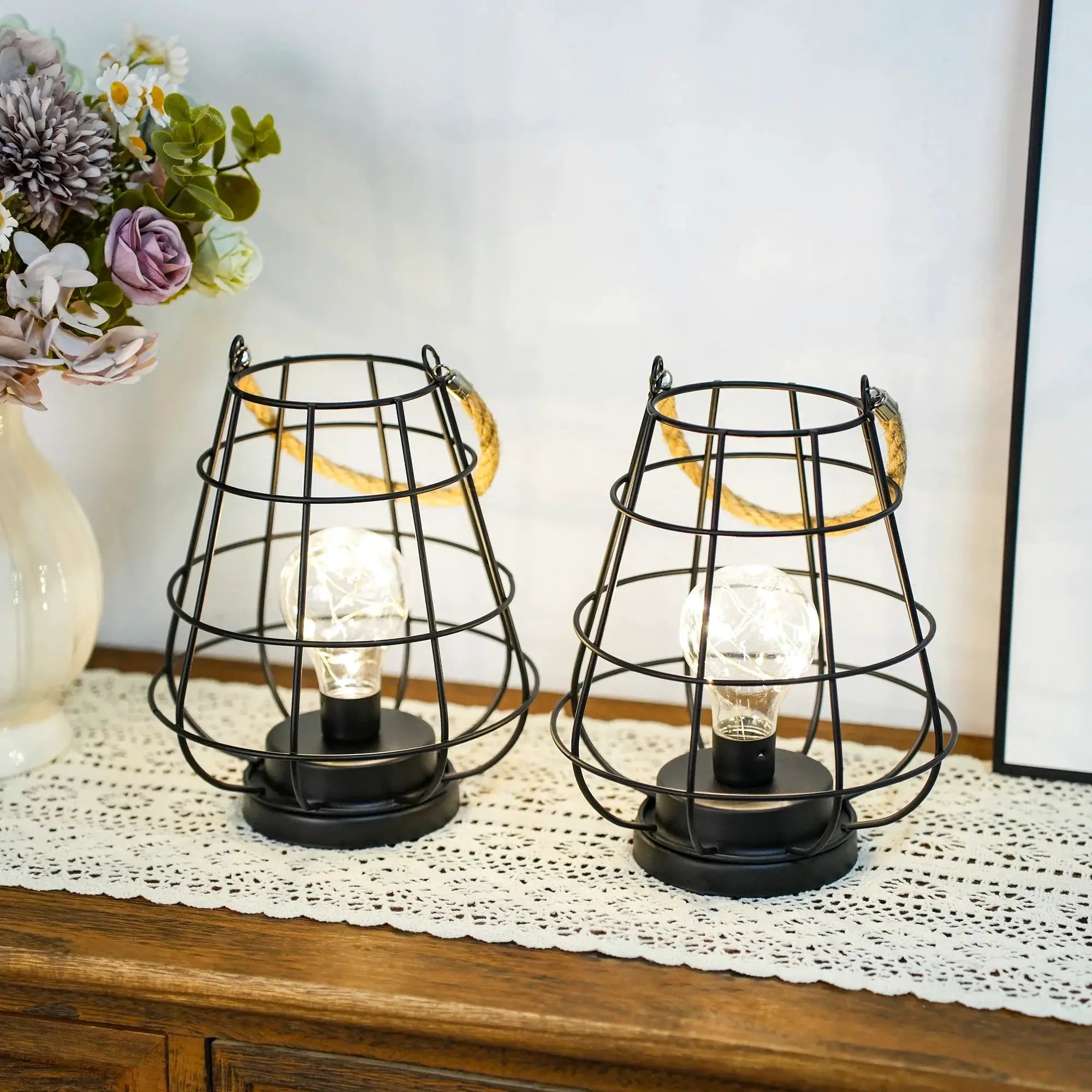 Set of 2 cage bulb lantern table lamps, black metal wire frames with exposed bulbs, battery-operated