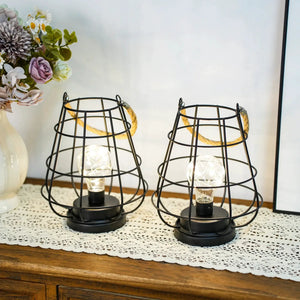 Set of 2 cage bulb lantern table lamps, black metal wire frames with exposed bulbs, battery-operated