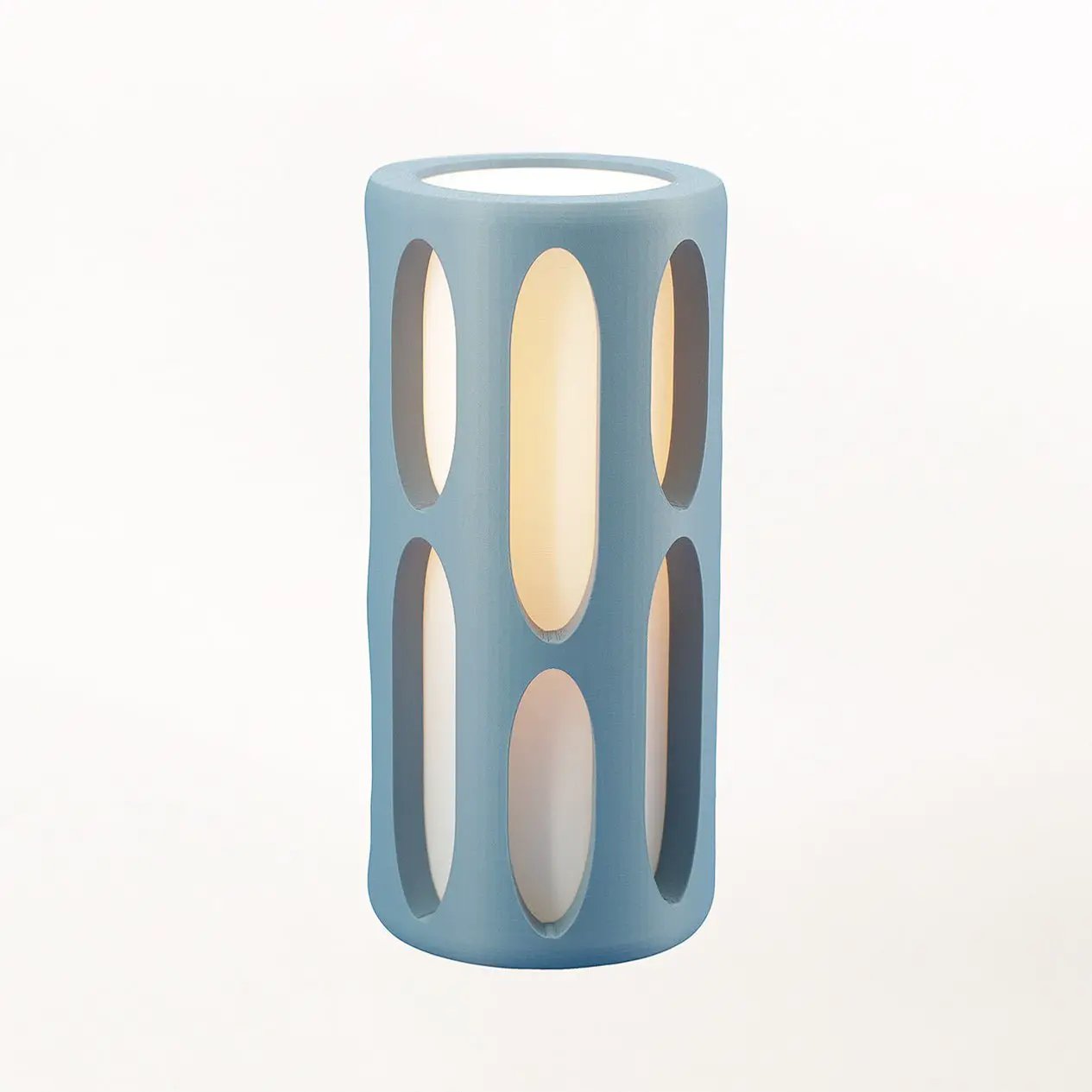 Amoeba table lamp blue with vertical oval cutouts, Terra Labs.