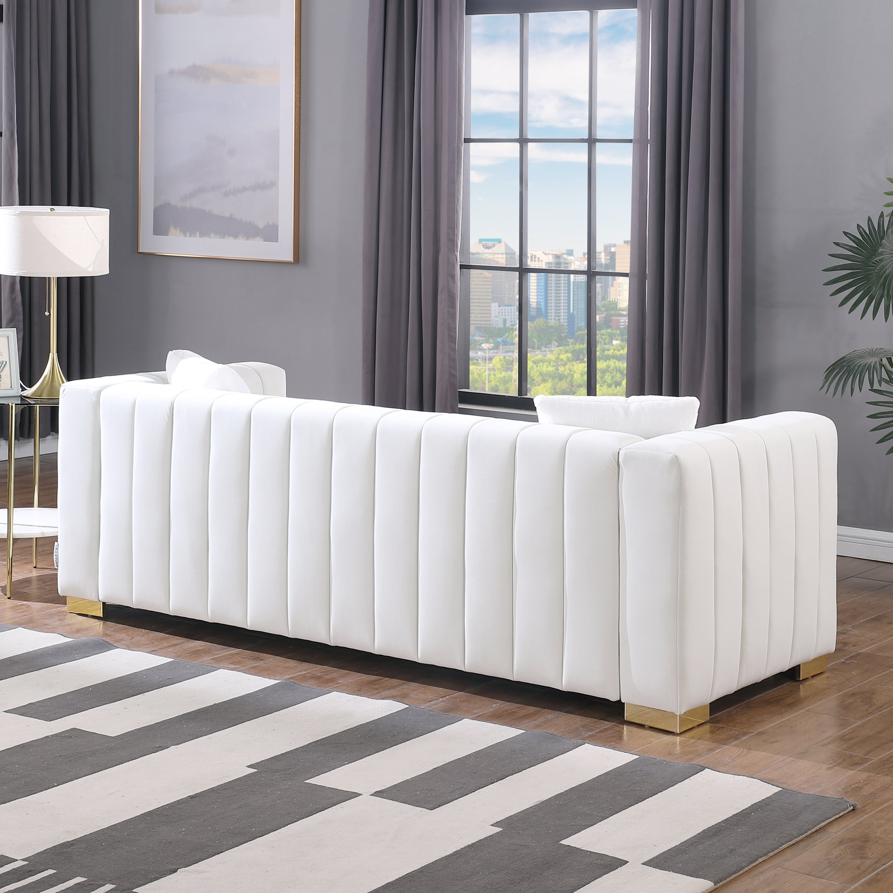 A modern  channel sofa  take on a traditional Chesterfield,White color,3 seater