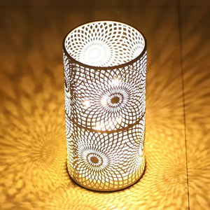 Battery-powered table lamp set of 2 by JHY DESIGN; cylindrical metal lamp with intricate circular floral lattice, warm glow.