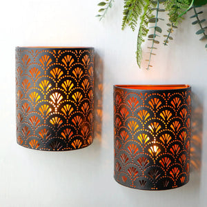 Set of 2 8-inch wall sconce lamps with perforated metal fan-pattern and warm amber glow