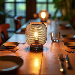 Table lamp with bronze mesh cage, battery-operated and touch-adjustable; pair on dining table