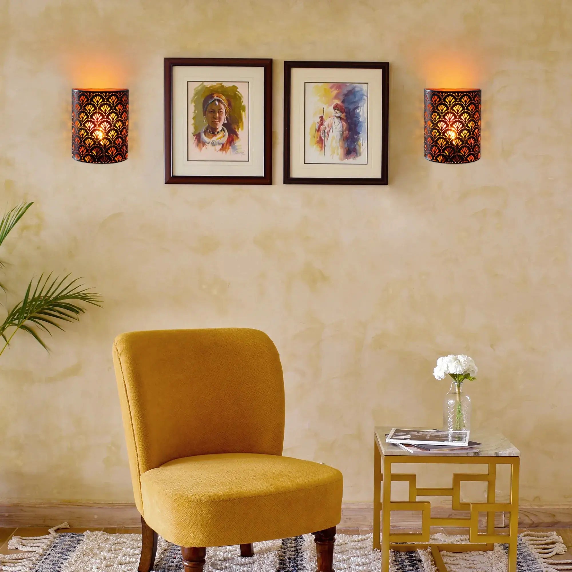 Set of 2 8''H battery-operated wall sconces with dark perforated metal shades and warm amber glow.