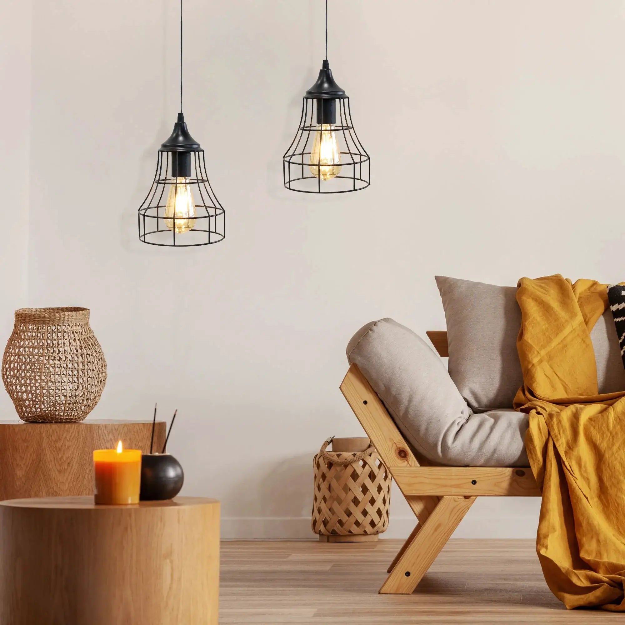 Set of 2 black metal cage pendant lamps on cords, battery-operated.