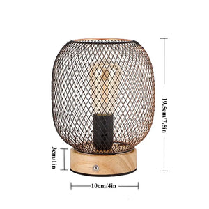 7.5in touch-adjustable table lamp; battery-operated with wooden base and bronze wire cage by JHY DESIGN