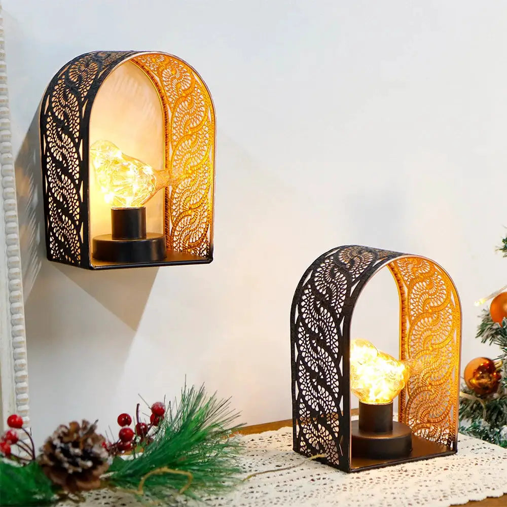 Set of 2 7-inch black metal lace battery-operated wall sconces with warm amber fairy lights