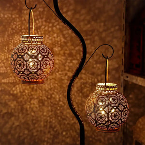 Set of 2 Moroccan 7-inch battery-operated lamps with intricate perforated metal lanterns and warm glow