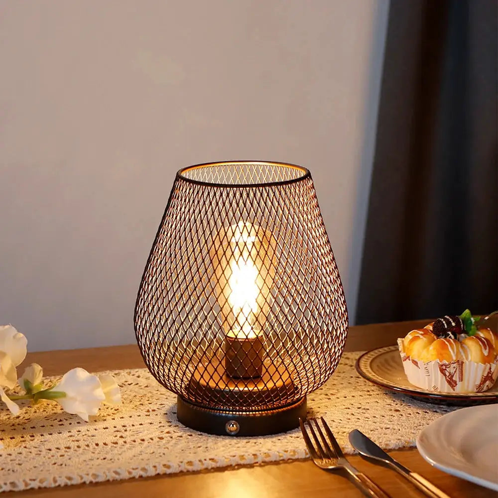 6.7H Touch Adjustable Table Lamp by JHY DESIGN with bronze metal cage and metal base, battery operated