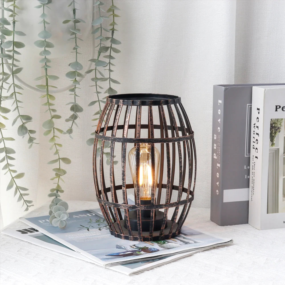 8"H cordless metal wine barrel lamp in black brushed gold with Edison bulb