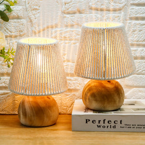 Set of 2 woven cotton rope table lamps with gray rope shades and wooden bases.