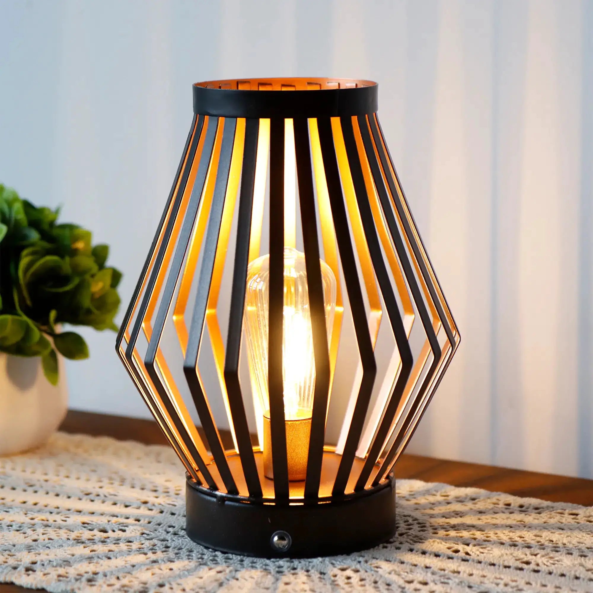 Set of 2 dimmable bedside table lamps with decorative black metal cage by JHY DESIGN.