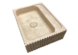 Oasis beige travertine wall-mount bathroom sink with fluted exterior sides and rectangular basin, 20x24 inches