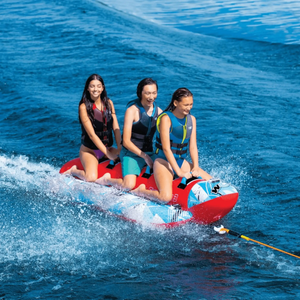 WOW Watersports Sub-Zilla 3-Person towable tube, red with three riders on blue water