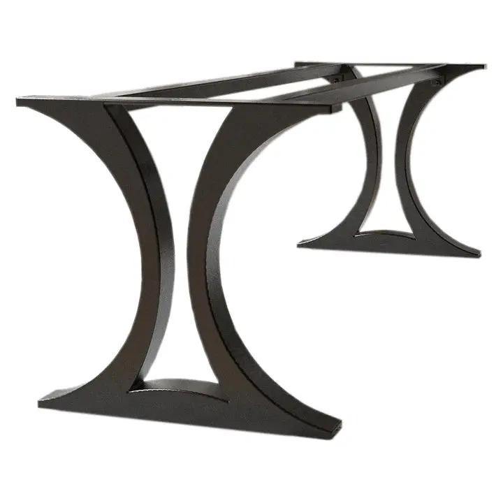 Pair of table legs for a modern metal dining table base in matte black with curved double-arch supports