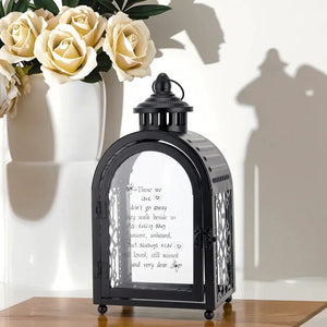 11'' high memorial lantern, black metal with glass panels and ornate lattice, auto timer