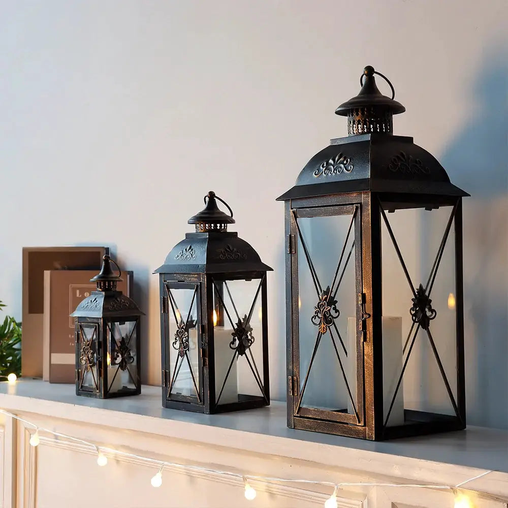 Set of 3 black metal and glass hanging candle lanterns, 19in, 13.5in and 9.5in, JHY DESIGN.