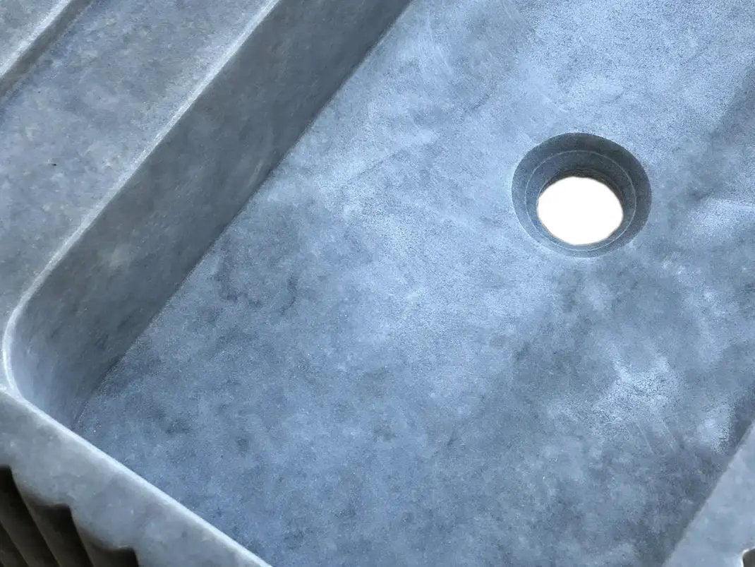 Bluestone marble rectangular wall-mount bathroom sink by Villohome with fluted edge and centered drain hole
