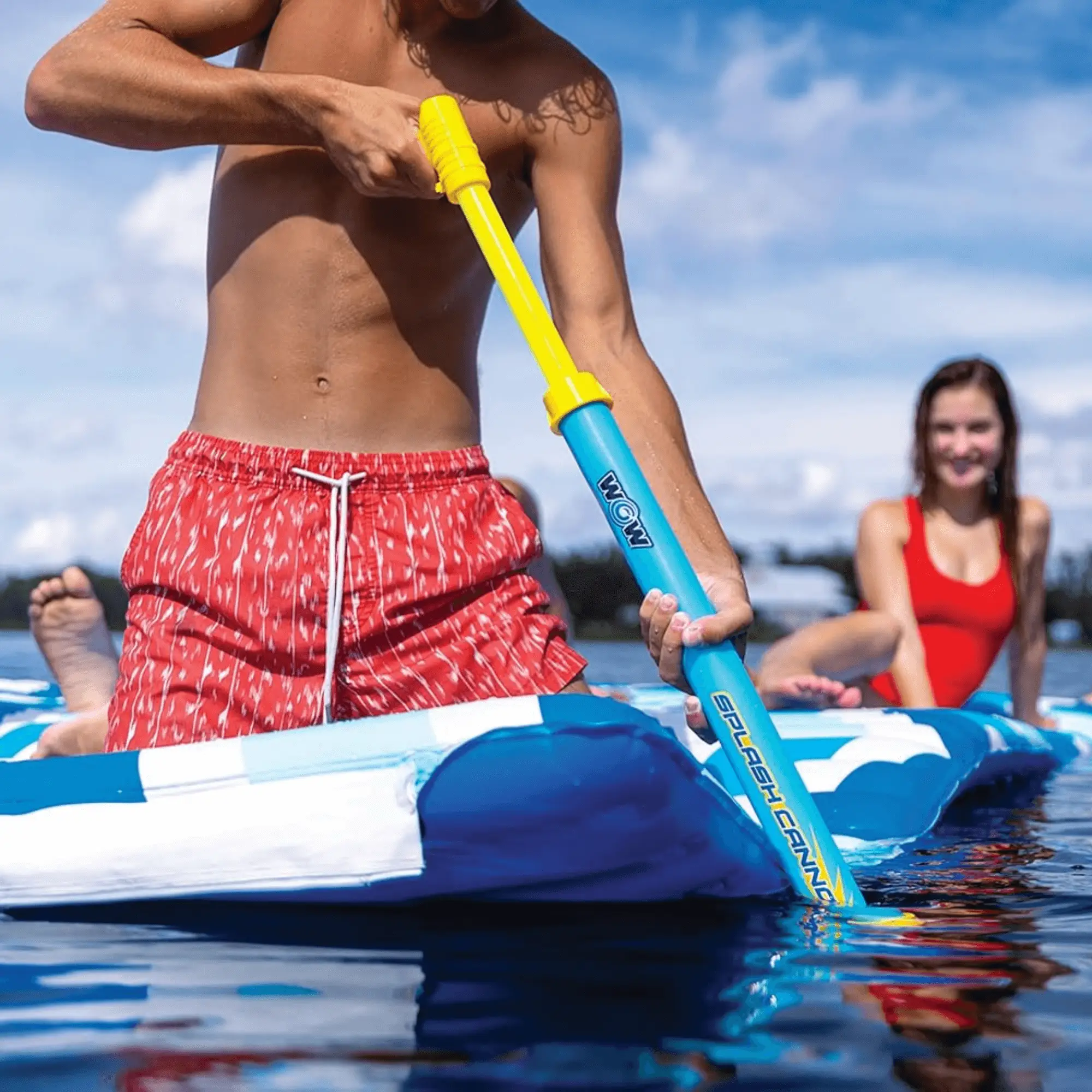WOW Watersports Splash Cannon water toy; bright yellow cannon with blue shaft.