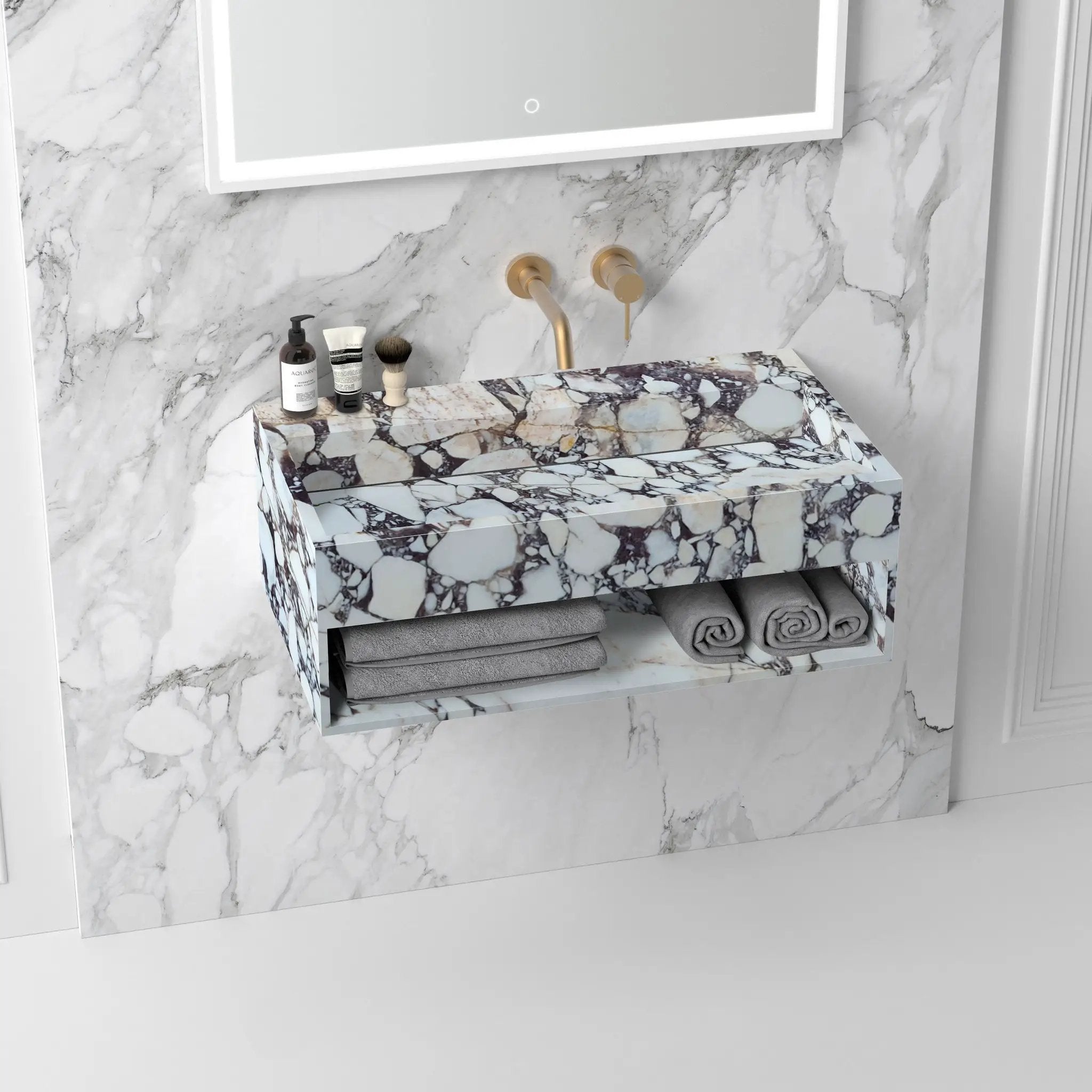 Calacatta Viola marble wall-mount bathroom sink with storage and gold faucet