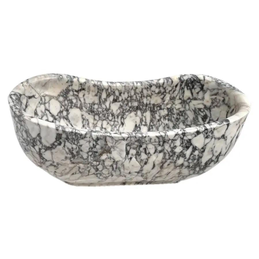 Calacatta Viola freestanding marble bathtub by Villohome, hand-carved from solid marble block.