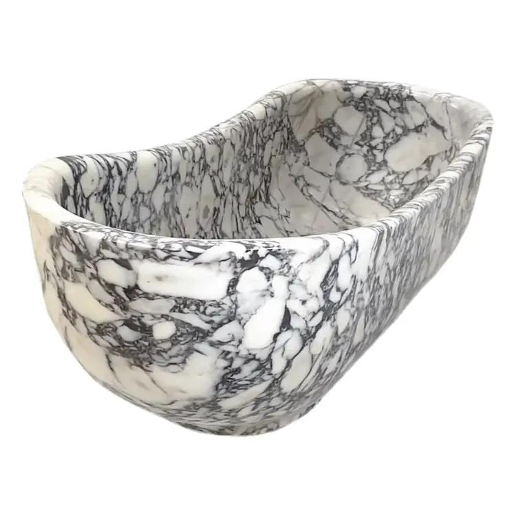 Calacatta Viola freestanding marble bathtub, hand-carved from solid block with white and gray veining