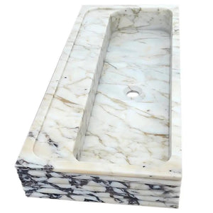 Calacatta Viola gold marble wall-mount bathroom sink by Villohome, rectangular long trough with white and gold veining