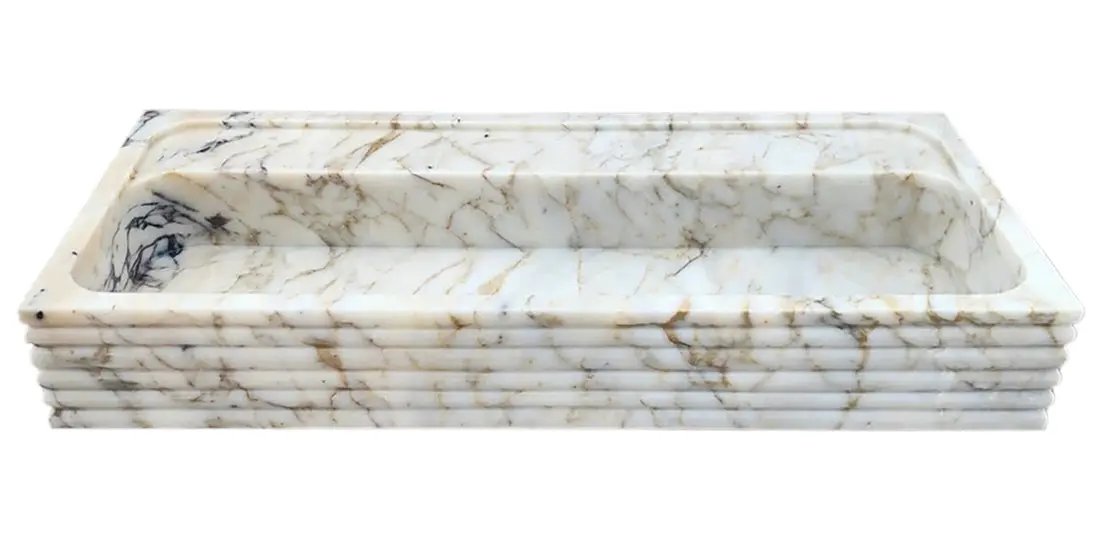 Calacatta Viola gold marble wall-mount bathroom sink by Villohome, horizontal fluted design