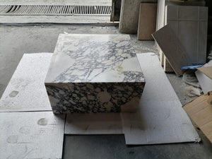Calacatta Viola marble coffee table, rectangular block with white surface and gray veining, 24x24x12 in