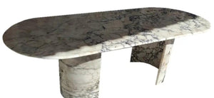 Calacatta Viola marble oval dining table by Villohome with polished finish and C-shaped legs