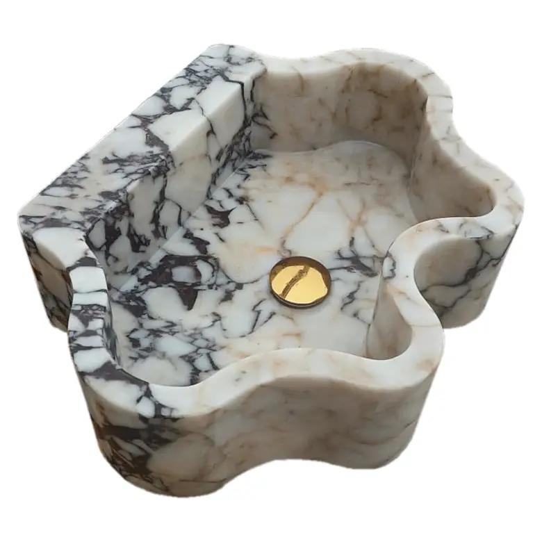Calacatta Viola marble wall-mount bathroom sink by Villohome with wavy-edge design, 16x21x6 inches