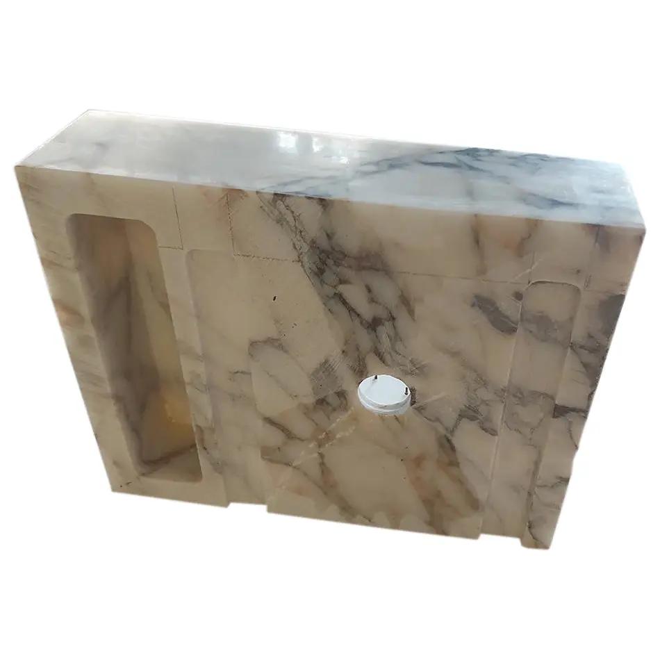 Calacatta Viola marble wall-mount bathroom sink with left recessed niche