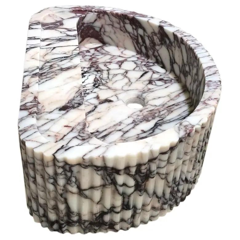 Calacatta Viola marble wall-mount fluted half-round bathroom sink by Villohome, white with dark veining.