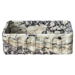 Calacatta Viola marble wall-mount bathroom vanity sink with fluted front.