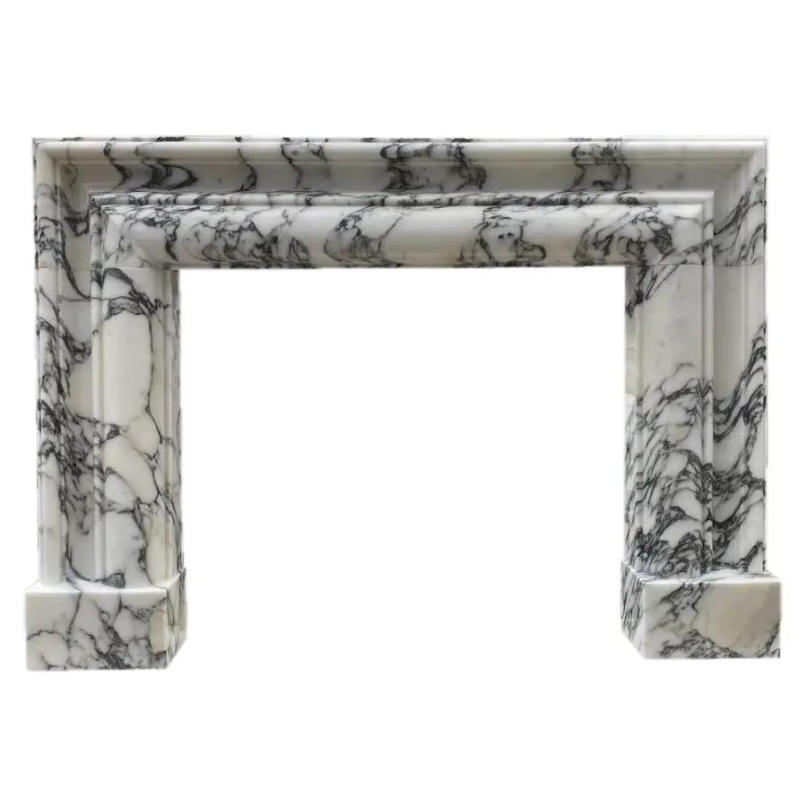 Calacatta Viola marble fireplace mantel by Villohome, hand-carved, polished white with dark veining.