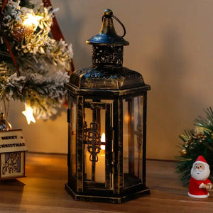 10inch High Decorative Candle Lantern, black distressed metal with glass panels and a lit candle inside