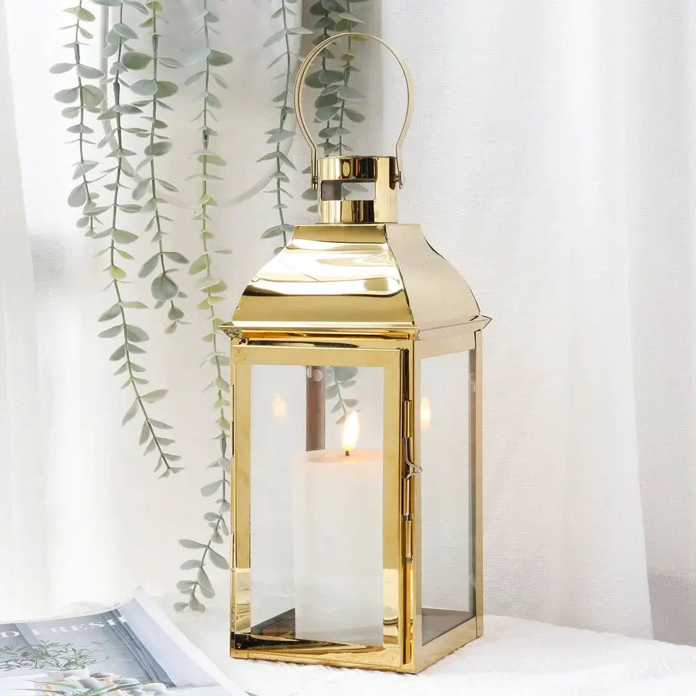 12.5-inch high decorative candle lantern by JHY DESIGN, gold with glass panels and a metal loop handle